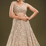 Gold Sequins Embroidered Net Reception Lehenga with Sweetheart Neck Blouse-JE2345